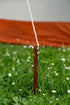 Coghlan's 7 mm utility cord tied to a tent stake as a guy line