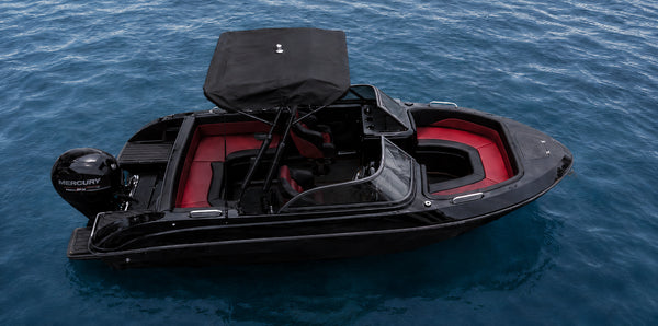AquaJet 20 open bow sport boat in black on the water