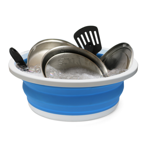Coghlan's collapsible sink holding camp dishes