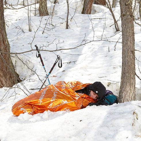 Lifesystems Thermal Bag used as an emergency shelter in snow