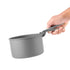 Coghlan's pot holder gripping the rim of a camping pot