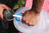 Pouring water from a Coghlan's expandable camp jug at a picnic table