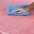 Coghlan's picnic tablecloth edge on a picnic table, close up
