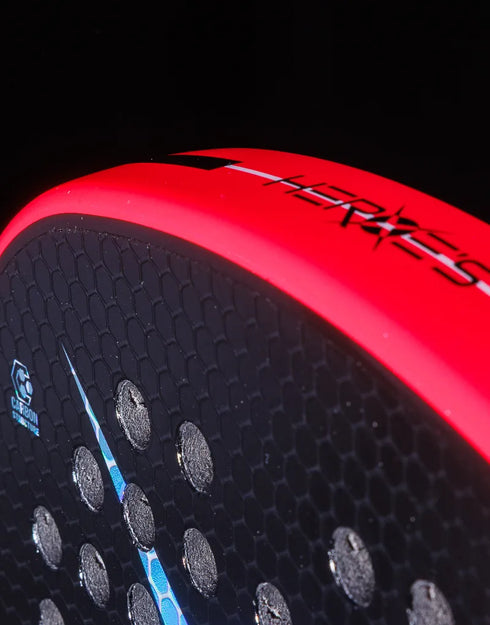 Heroe's RS2 2025 Padel Racket in neon pink, close-up detail
