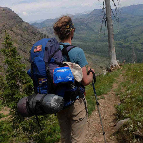 Adventure Medical Kits Mountain Series INTL Backpacker – International First Aid Kit optimized for Foreign Travel and Backpacking