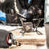 Primus OmniFuel stove with pot on a camp table, lifestyle