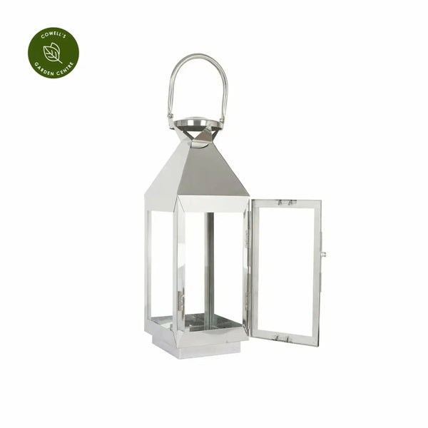 La Hacienda Palma Lantern, a stylish and functional outdoor lantern for atmospheric lighting.