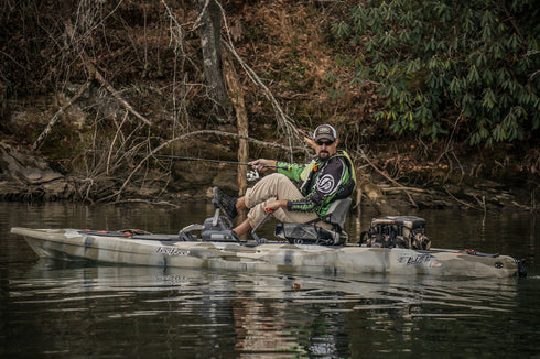 Feelfree Lure 13.5 V2 kayak angler fishing from the seat, lifestyle