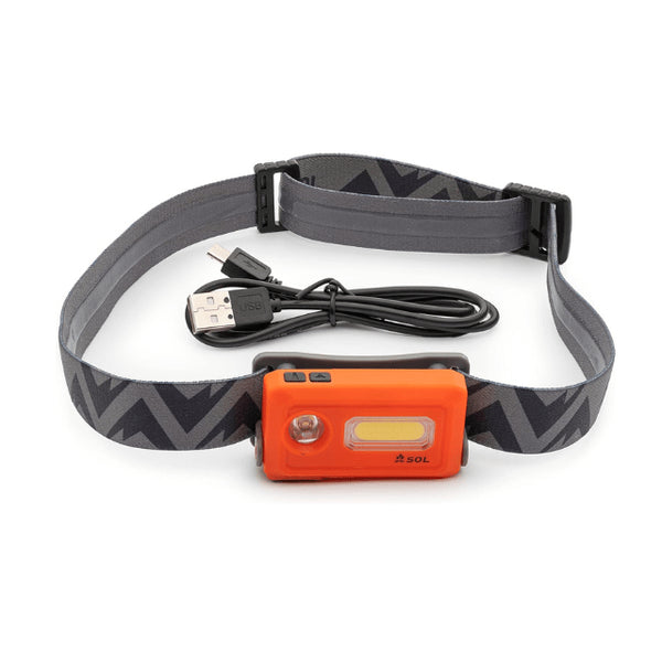 SOL Venture Rechargeable Headlamp, a bright and adjustable LED light providing hands-free illumination for outdoor use.