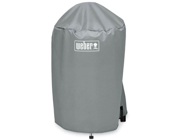 Weber Charcoal Kettle Grill Cover, a durable, weatherproof black cover providing protection for 18-inch kettle grills.