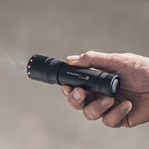 Ledlenser P7 flashlight, in use outdoors