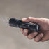 Ledlenser P7 flashlight, in use outdoors