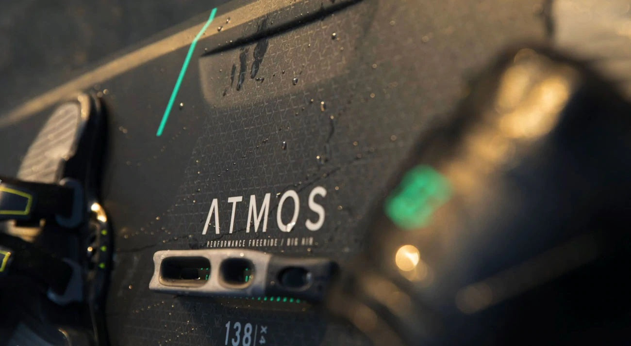 north-2021-atmos-carbon-twintip-board-action2_1349x.progressive