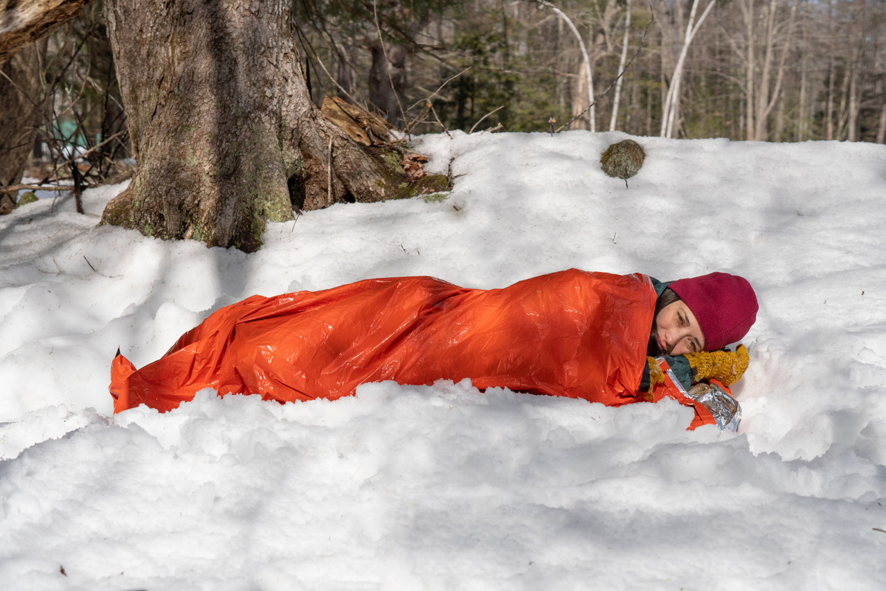 0140-1142-Emergency-Bivvy-Orange-w-whistle-2-laying_down__63738.1693582250